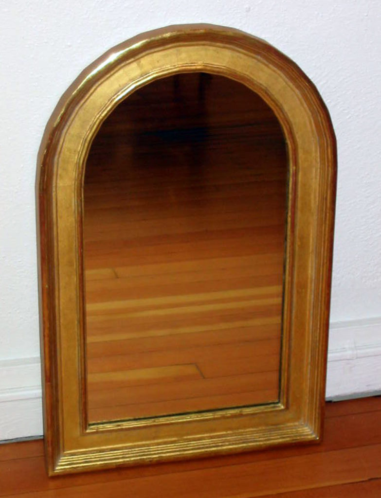 Hand crafted arched mirror frame, water gilded in 23K gold.